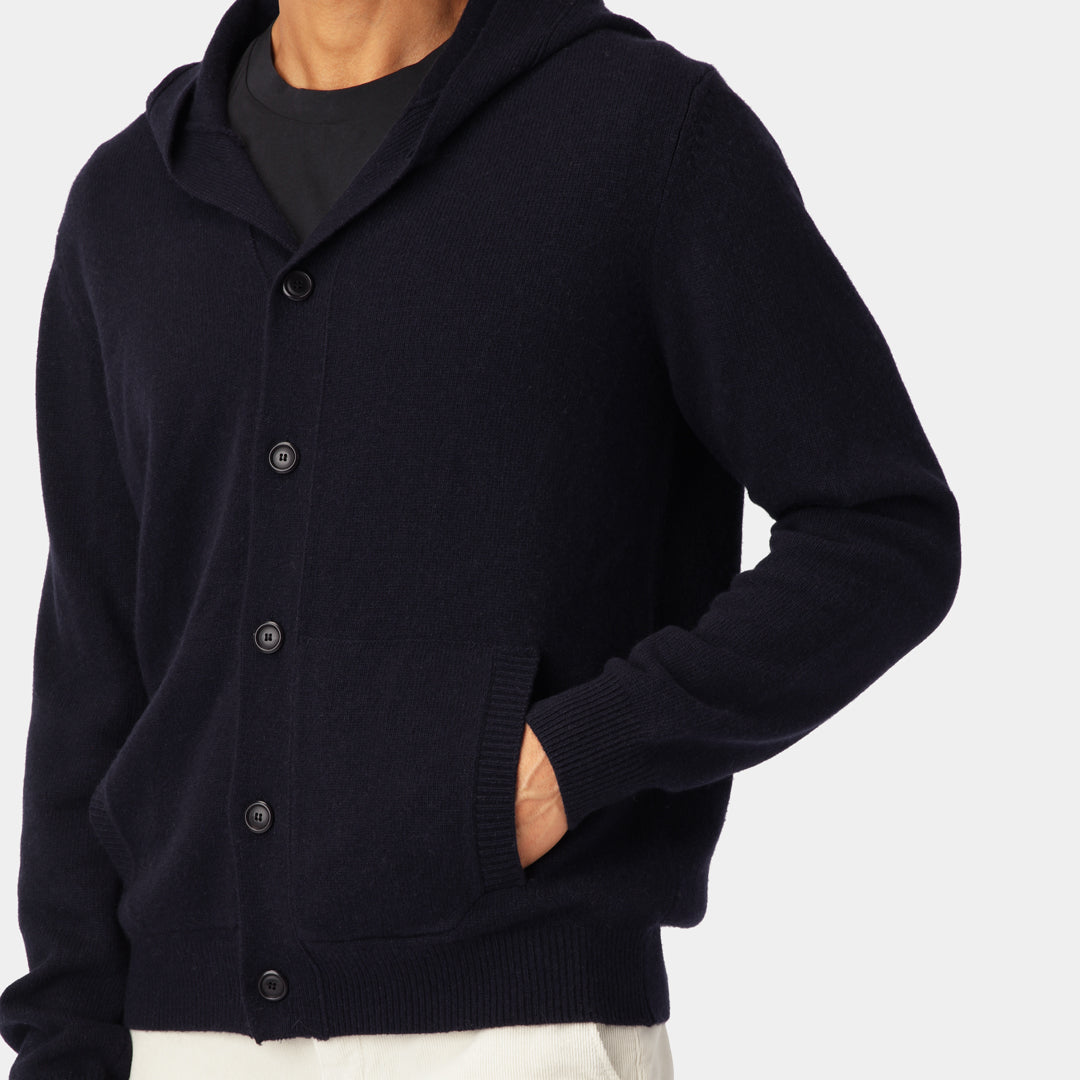 A men's knitted navy cardigan in 100% wool.