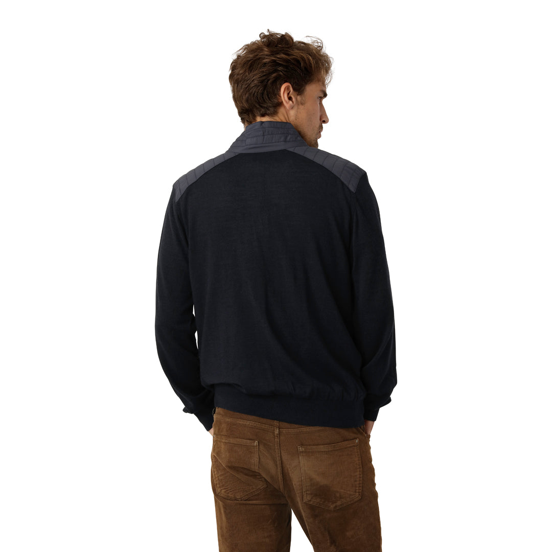 Back view of our navy zip merino cardigan for men, showcasing its streamlined fit and elegant wool texture.